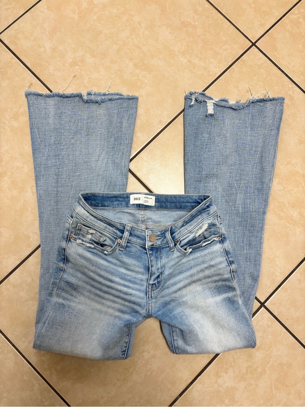 BKE Stella low rise flare jeans in blue, size 26x29.5